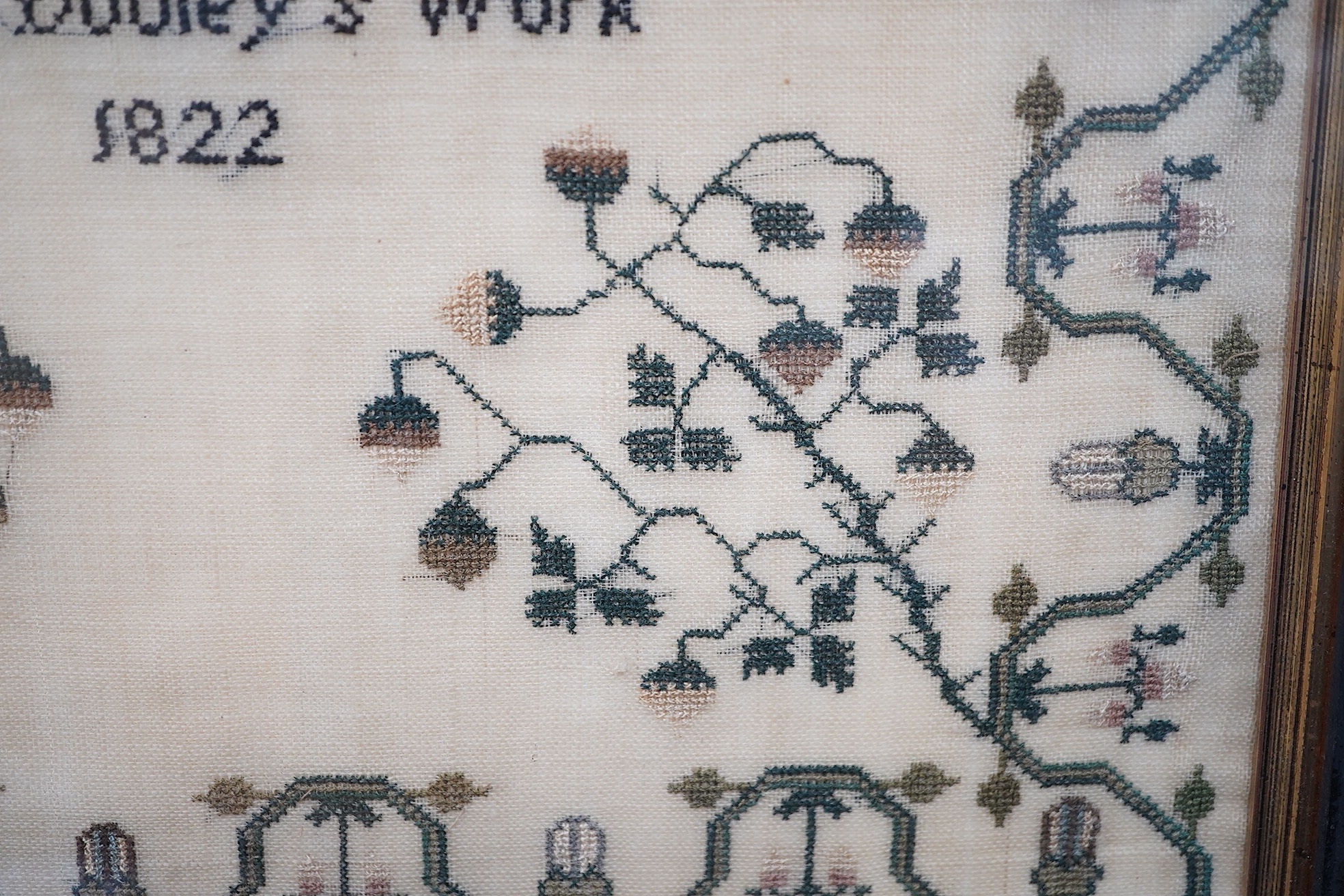 Two early 19th century finely worked samplers: One 'A Sublime Thought', dated 1822 by Ann Dudley, simply worked with verse and a wide vineous border and two oak trees, the other a register of the children of Samuel and A